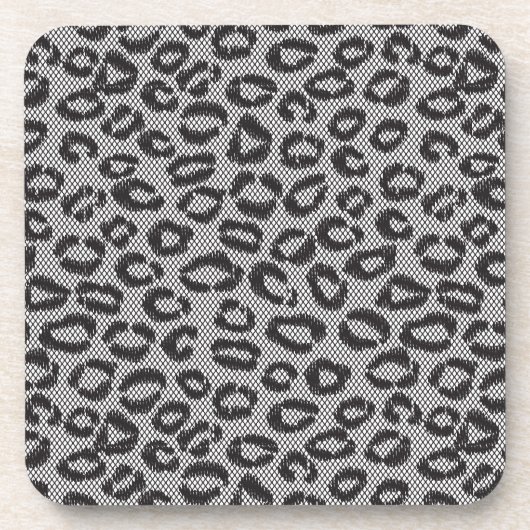 白のヒョウパターンが付いている黒い純レース コースター (正面)