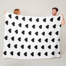 白のフリースの毛布黒いハート