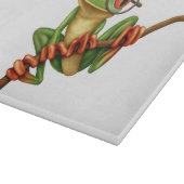 白の目ガラスを持つかわいい緑のアマガエル カッティングボード (角)