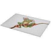 白の目ガラスを持つかわいい緑のアマガエル カッティングボード (角)
