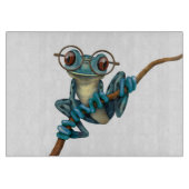 白の目ガラスを持つかわいく青いアマガエル カッティングボード (正面)