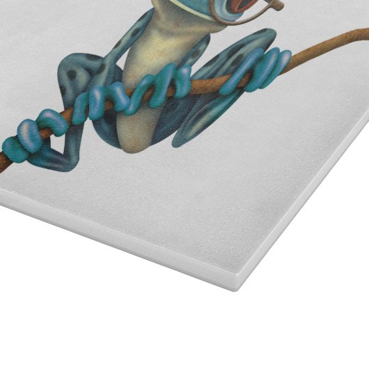 白の目ガラスを持つかわいく青いアマガエル カッティングボード (角)