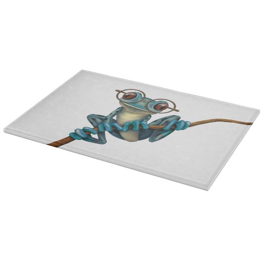 白の目ガラスを持つかわいく青いアマガエル カッティングボード (角)