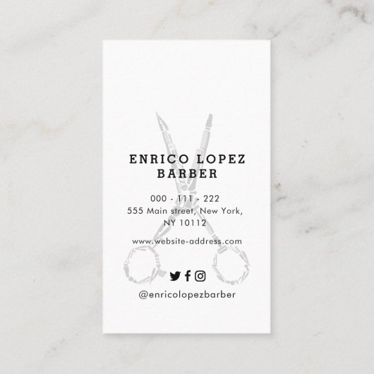 白エレガントと黒のヘアカットとシャーブの理容師 名刺 (裏面)
