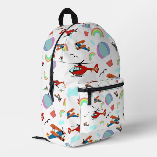 白地に描かれた少年の飛行パターン プリントバックパック (裏面左端)