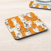 白猫と生姜の猫が緑の目を青く描く コースター (左側)