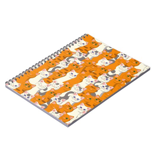 白猫と生姜の猫が緑の目を青く描く ノートブック (左側)