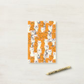 白猫と生姜の猫が緑の目を青く描く ポストイット (デスク上)