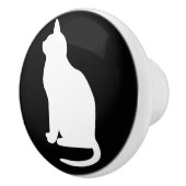 白猫に向かって座離れる セラミックノブ (右)