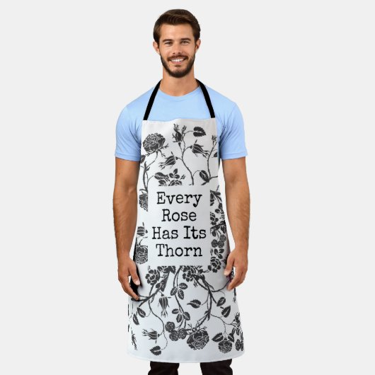 白黒すべてのバラはトゲ引用文 エプロン (着用した状態)