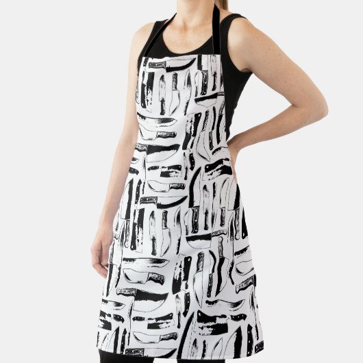 白黒のシェフまたは肉屋のナイフパターン(の模様が)ある エプロン (インサイチュ)