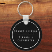 白黒のバイリンガルピーナッツアレルギー警告 キーホルダー (正面)