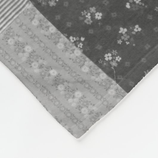 白黒のパッチワークの四角いヴィンテージ フリースブランケット (角)