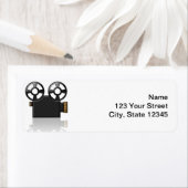 白黒のムービーカメラと白の金ゴールド ラベル (インサイチュ)