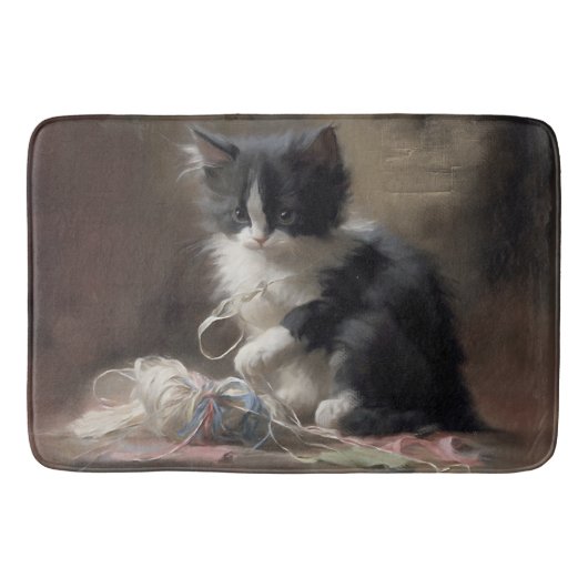 白黒の子猫におもしろいが絡まっている バスマット (正面)