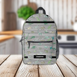 白黒の恐竜の緑ストライプ プリントバックパック