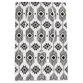 白黒の民族イカットの幾何学的パターン ミディアムペーパーバッグ (正面)