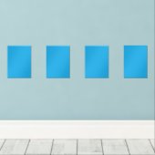 白黒の猫が乗った青い背景 (ウッドフロア)