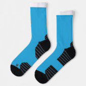 白黒の猫が乗った青い背景 ソックス (左)