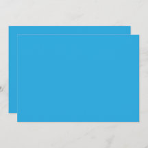 白黒の猫が乗った青い背景