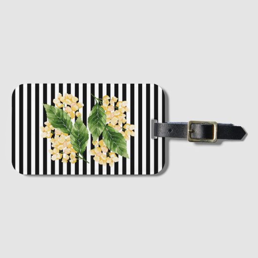 白黒の花に黄色の花を付けストライプる ラゲッジタグ (正面横)