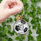 白黒チームの選手の名前の女の子サッカー キーホルダー (手)