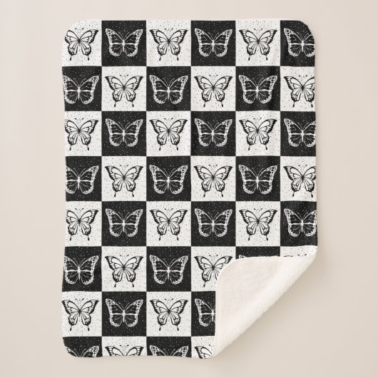 白黒バタフ市松模様にロックプリント シェルパブランケット (正面)