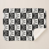 白黒バタフ市松模様にロックプリント シェルパブランケット (正面(横))