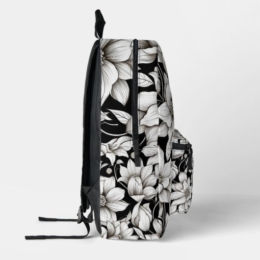 白黒フラワーズモノグラムネームキャンプスクール プリントバックパック (左)