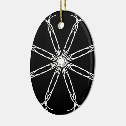 白黒万華鏡のように千変万化するパターン星 セラミックオーナメント (左)