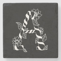 白黒文字「A」、巻き花