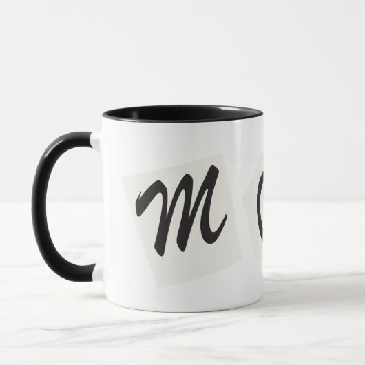 白黒MOMマガジン文字 マグカップ (左)