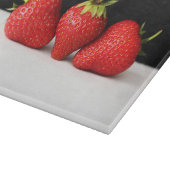 白Cbcnaの上の黒のイチゴ カッティングボード (角)