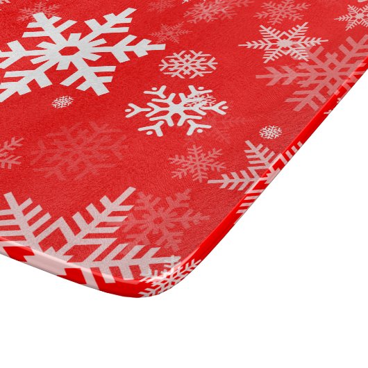 皆のための赤の休日の雪片のモチーフ カッティングボード (角)