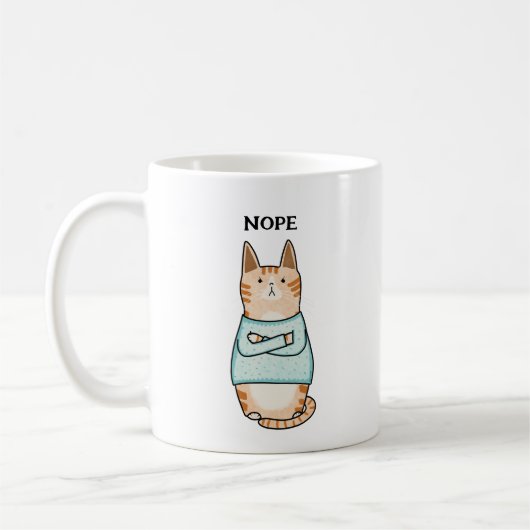 皮肉おもしろいなオレンジキャットノペ コーヒーマグカップ (左)