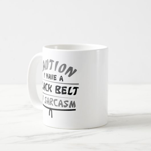 皮肉で黒いベルト コーヒーマグカップ (正面左)