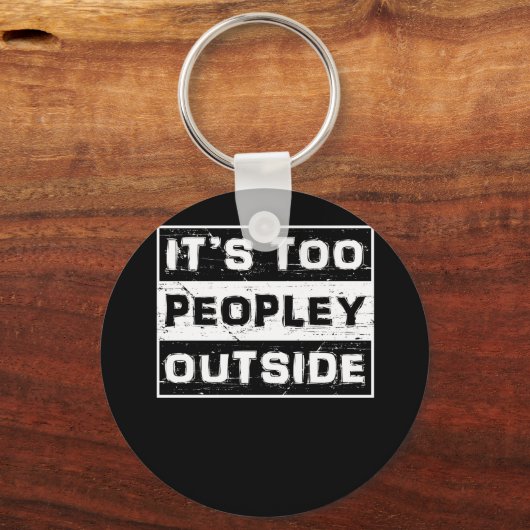 皮肉なことわざの外で人おもしろいが多すぎる キーホルダー (正面)