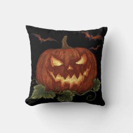 目とこうもりの白熱［赤熱］光を放つ大きなカボチャ クッション