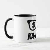 目にドル記号 Ka-ching マグカップ (左)