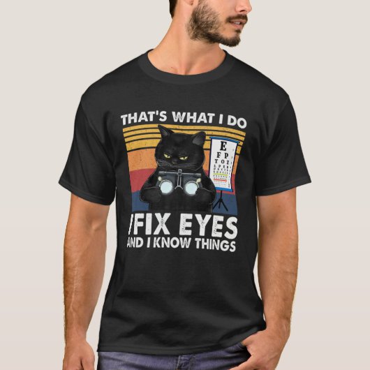 目のことを何でも直す黒猫の眼鏡屋さん Tシャツ (正面)