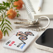 目の熱狂する鼻メガネが新しい車の匂いを嗅ぐ キーホルダー (正面右)