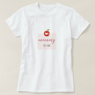 目の赤ちゃんシャワーのリンゴ Tシャツ
