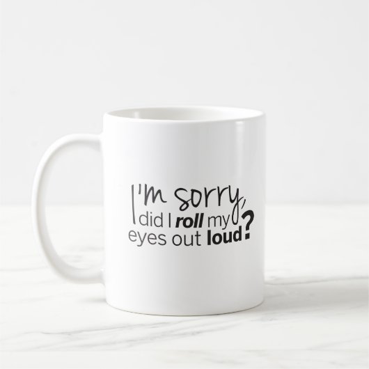 目を大きくし転がてごめんユーモアのある コーヒーマグカップ (左)