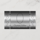 目を引く銀色に丸まった宝石を写真で留める 名刺 (正面)