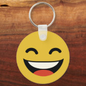 目を閉じて絵文字を笑う キーホルダー (正面)