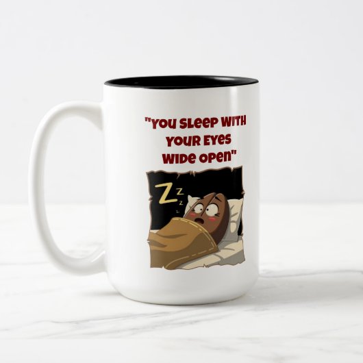 「目を開けて眠る」コーヒーマおもしろいグ ツートーンマグカップ (左)