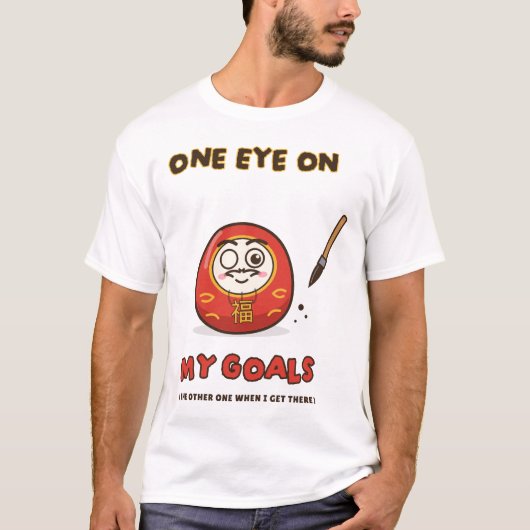 目標に一つの目 ダルマ 願い事 目標設定 Tシャツ (正面)