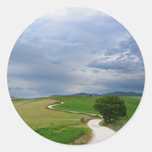 目的地の丸いステッカーに向かうカーブした道路 ラウンドシール (正面)