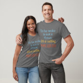 目覚めることは脅威ではない。 Tシャツ (ユニセックス)