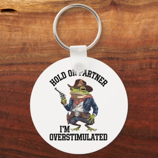 相手を掴む俺はカウボーイカエルを刺激し過ぎている キーホルダー (正面)